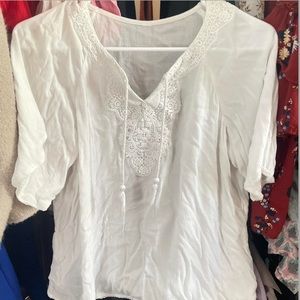 White blouse boho type with amazing detailing along neckline and half sleeve